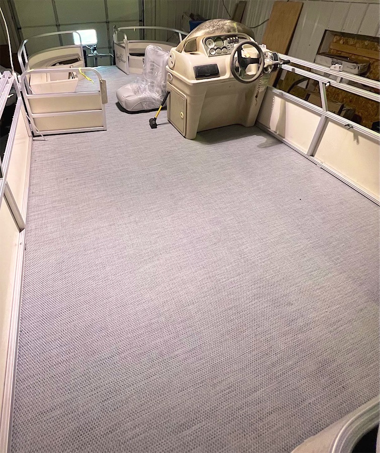 Finished pontoon re-deck in woven vinyl
